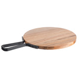 A round acacia serving paddle with a smooth surface and a black metal handle attached to one side, shown on a white background. The handle is rectangular, flat, and secured with screws. Perfect for the Industrial Collection Serving Paddle line.