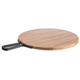 A round acacia serving paddle with a smooth surface and sturdy black metal handle lies flat on a white background. The natural wood grain patterns and open rectangular handle evoke the style of the TableCraft serving paddle.