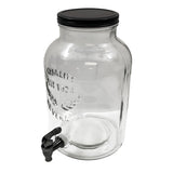 This 2 gallon beverage dispenser features clear glass, a black plastic spigot, and a round black lid. Embossed text and a decorative laurel add charm to the front. The glass beverage dispenser is empty and set against a white background.