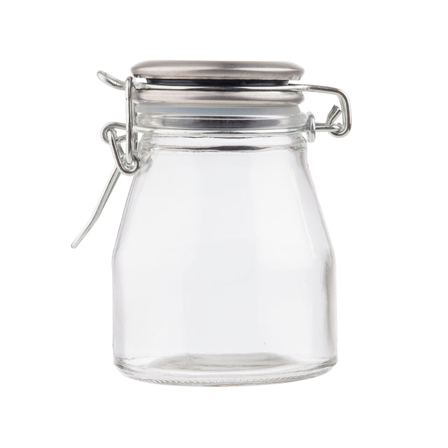 A small, empty clear glass spice jar with a wide mouth and a resealable stainless steel clamp lid. The lid features a metal hinge and latch mechanism, and the clean jar sits upright on a white background with no label or content inside.
