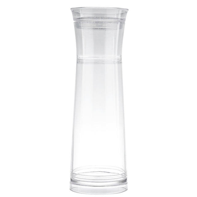 A tall, clear glass carafe with a slightly flared rim and narrow neck sits against a plain white background. Featuring a simple, minimalist design, this carafe comes with a strainer for easy gravity flow pouring.