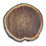 A cross-section of a tree trunk displays concentric growth rings and rough bark around the edge, making it an ideal inspiration for a TableCraft platter. Its natural colors and patterns bring rustic charm to any presentation.