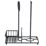 A sleek black steel caddy kitchen organizer with three sections: a square basket for condiments, a vertical ring paper towel caddy, and a tall rod for utensils. It stands on four small ball feet and keeps essentials neatly organized.
