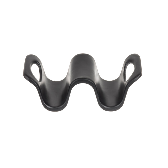 A black, curved melamine object with a wavy shape, featuring two oval openings on each side and a raised center, photographed on a white background—ideal for holding tacos like the Taco Taxi by TableCraft.