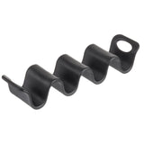 The TableCraft Taco Taxi is a black, wavy melamine taco holder with four curved slots to keep tacos upright. It features a rounded handle with an oval hole for easy gripping or hanging, and its surface is smooth with an elongated, zigzag shape.