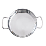 A shiny, round stainless steel mini brazier with two curved handles sits empty, viewed from above against a white background. Its smooth, reflective surface highlights its induction safe design.