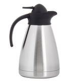 A stainless steel coffee carafe with a black plastic handle and lid. This vacuum insulated carafe has a sleek, cylindrical design with a slightly tapered body, keeping beverages hot or cold. The spout is integrated into the lid for easy pouring.