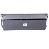 A rectangular black metal object, possibly a TableCraft bar condiment holder for 6 pint inserts, is wrapped in clear plastic. A white barcode sticker is centered on the front surface and the item is photographed against a plain white background.