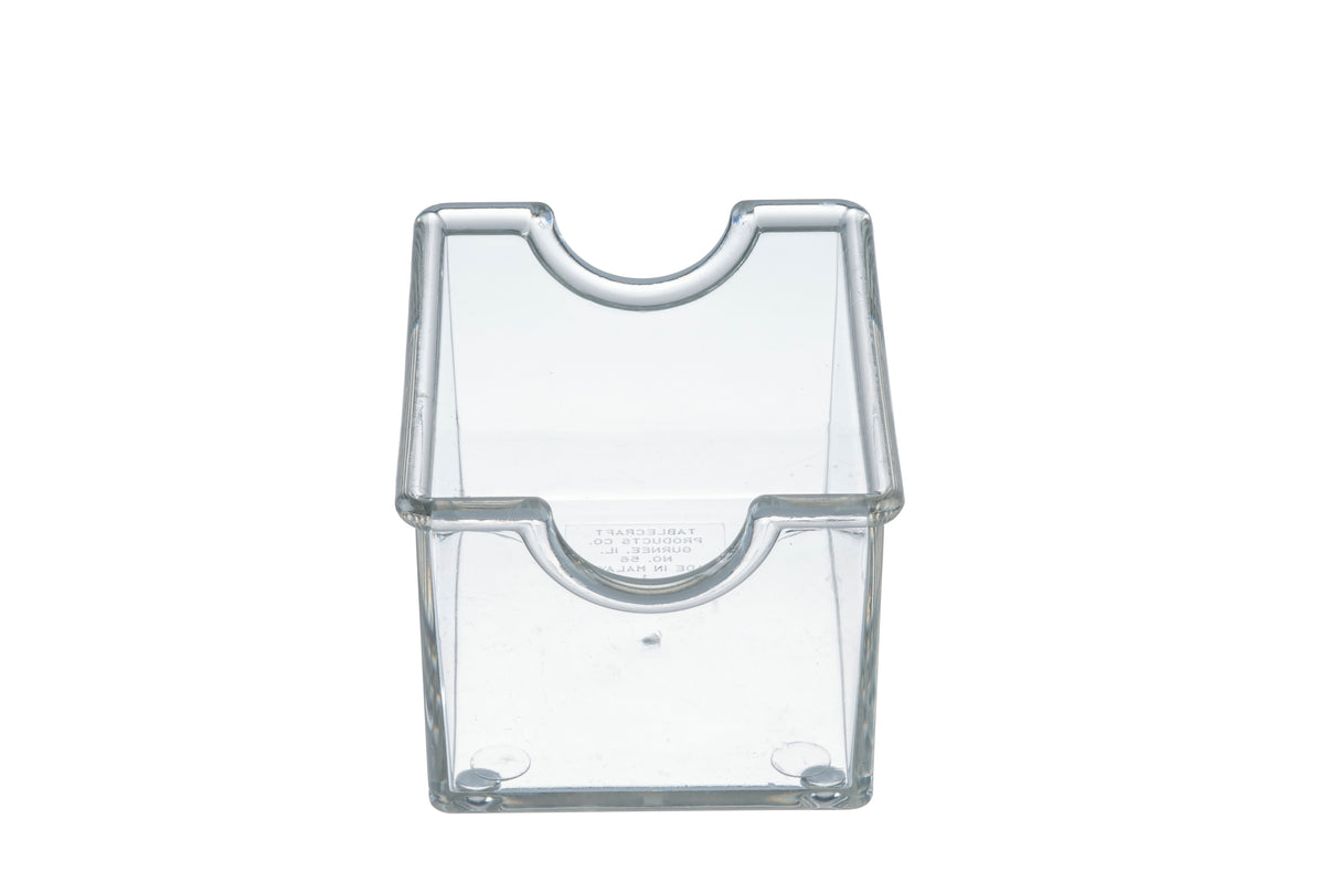 A clear, rectangular acrylic Sugar Packet Holder with an open top and a half-circle notch at the front, designed for easy access to contents. This TableCraft holder is empty and stands upright on a white background. Dishwasher safe for easy cleaning.