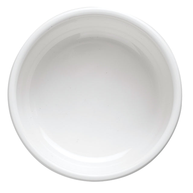 A plain, empty, round white ceramic bowl viewed from above, set against a white background. The bowl has smooth, slightly raised edges and a glossy finish—similar in simplicity to a TableCraft 10311W or dishwasher safe plate.