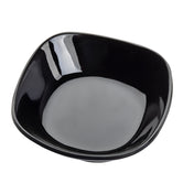 A glossy, empty TableCraft 10315BK black ceramic bowl with rounded square edges is shown against a white background. Its reflective surface creates white highlights on the inner rim. The perspective is slightly above and angled. Dishwasher safe for easy cleaning.