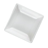 A square, shallow white ceramic dish, reminiscent of a mini melamine bowl, is shown at a slight angle on a plain background. Its smooth, glossy surfaces and gently rounded edges give it a clean and minimalist appearance. Dishwasher safe for easy care.