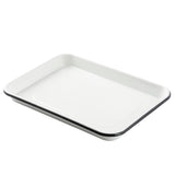A white rectangular 1/4 size enamel tray with a slightly raised edge and a black rim, placed on a white background. The tray has smooth, rounded corners and a glossy finish, resembling a compact sheet pan.