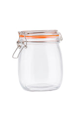 A clear, empty resealable glass canister with a round body and an orange rubber seal. Featuring a clip-top lid with a hinged metal clasp for airtight storage, the jar stands out against the plain white background.