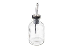 A clear glass bottle with a stainless steel pourer and black rubber stopper, perfect as an oil & vinegar bottle. Shown empty against a white background and viewed from a high angle.