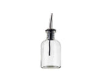A clear, empty glass bottle with a narrow neck and a stainless steel pourer. The spout features a black rubber stopper securing it to the oil & vinegar bottle. The plain white background keeps the bottle centered in the image.