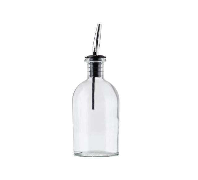 A clear glass bottle with a stainless steel pourer and black rubber stopper, typically used as an oil & vinegar bottle, is shown upright against a plain white background. The empty bottle is cylindrical in shape.