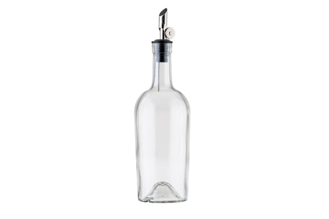 A clear glass Oil & Vinegar Bottle with a stainless steel pourer and black collar stands upright on a white background. Its base features a slight indentation, and the metal spout has a small cap attached for closing.