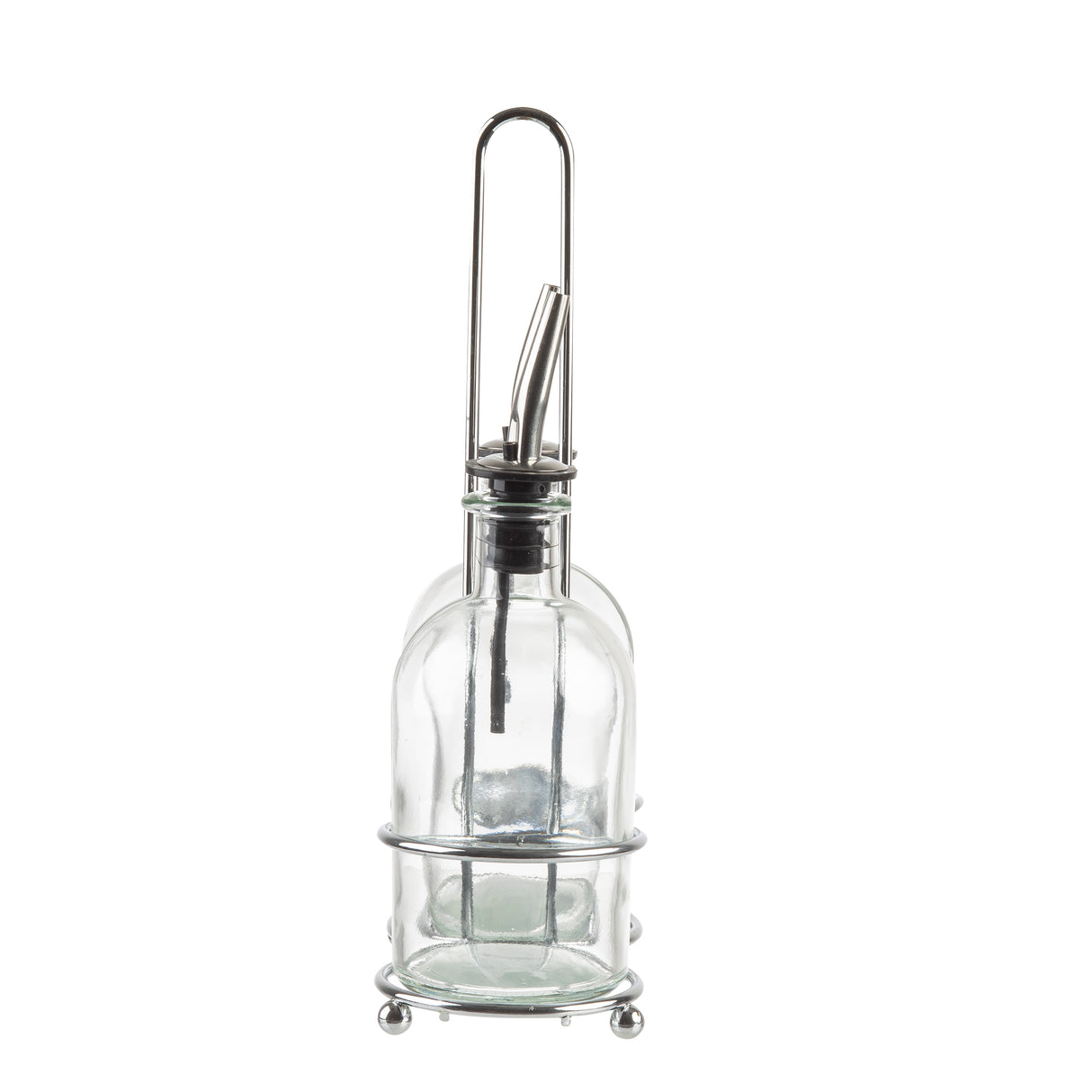 A clear glass Oil & Vinegar Bottle with a stainless steel pourer sits in a simple round chrome plated rack with a handle and four small ball feet. The bottle is empty, and the design is modern and minimalistic.