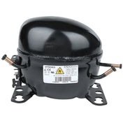 A black, dome-shaped refrigerator compressor with two mounting brackets at the base, labeled “Embraco.” Featuring copper pipes on each side and a warning label, it is a key component in Empura Refrigeration systems. The surface is glossy and industrial.