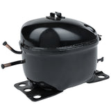 A black, oval-shaped Empura Compressor for E-KUC27 refrigeration with two protruding copper tubes and a flat metal mounting base with four bolt holes, shown against a white background. The glossy surface features minor highlights and reflections.