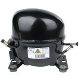A black, dome-shaped Empura Refrigeration compressor with attached pipes on both sides, metal mounting brackets at the base, and a label displaying technical information and warning symbols on the front. The background is plain white.
