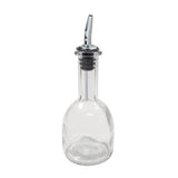 A clear 10 oz oil & vinegar bottle with a rounded base and narrow neck, topped with a stainless steel pourer featuring a black rubber stopper. The empty bottle is displayed against a plain white background.