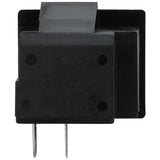 A close-up of a black electrical reed relay, similar to those used in Empura Door Switch E-EGM and Empura Refrigeration units, with two metal prongs for circuit connection. The rectangular face displays engraved ratings and manufacturer details.