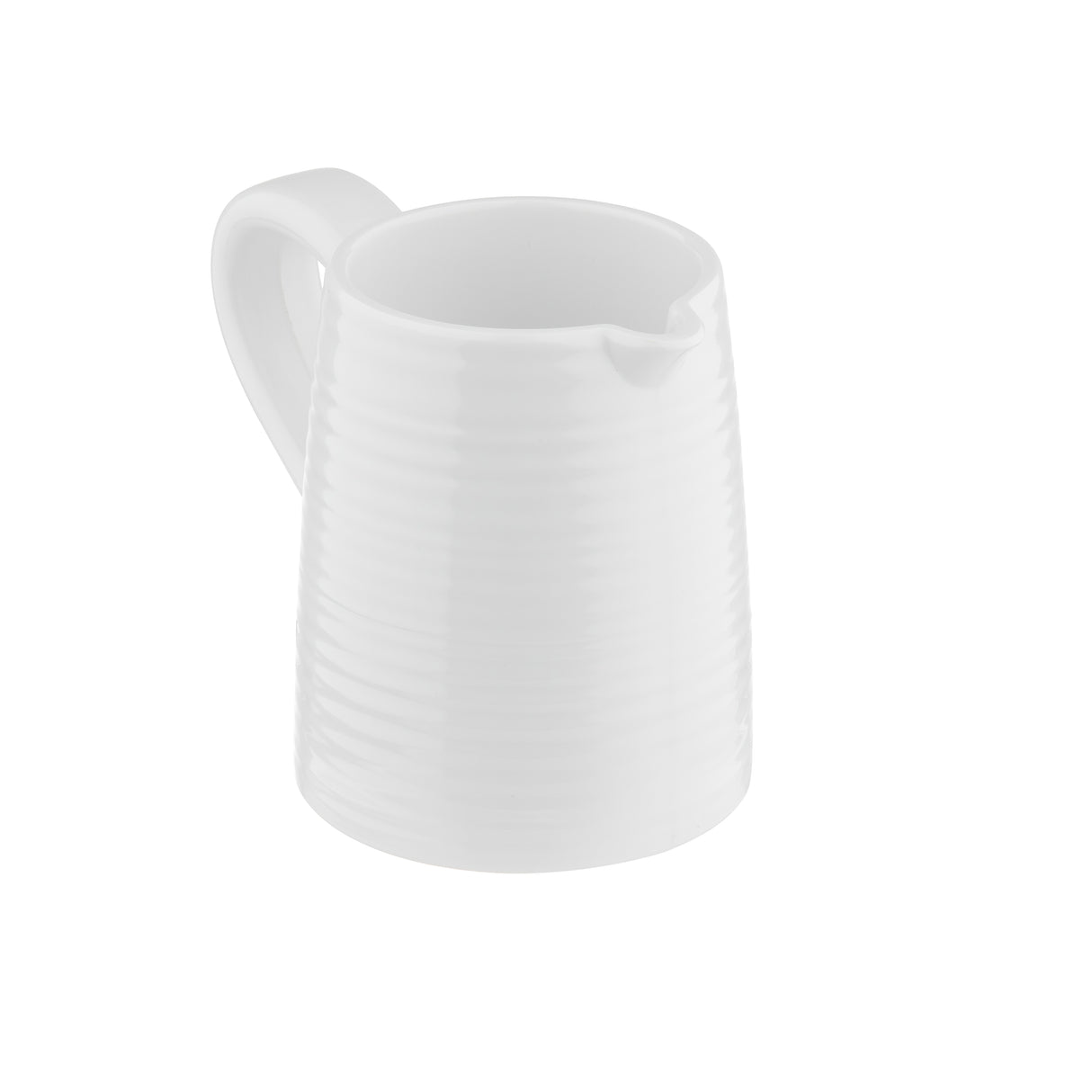 A white ceramic creamer pitcher from the Pulito Collection with a handle and small spout. Subtle horizontal ridges create a textured, modern look. The simple design stands out against a plain white background.
