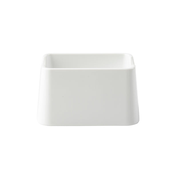 A plain, white, rectangular ceramic bowl from the Sierra Collection is centered on a white background. Ideal as a sugar packet holder, it appears simple and modern, with smooth, clean lines and no visible patterns or textures.