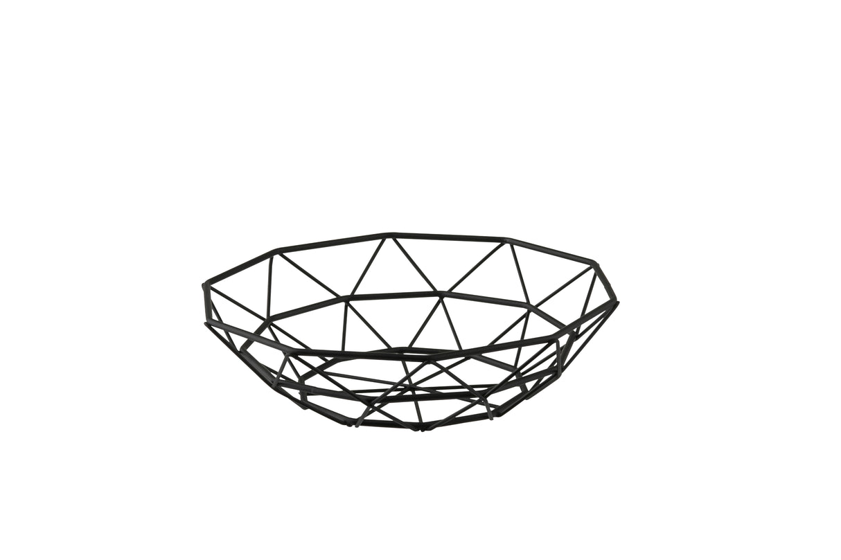 A modern, black TableCraft wire basket fruit bowl with a geometric pattern, crafted from powder coated steel. Its interconnected angular lines form a wide, shallow, circular shape and it sits empty on a white background.