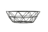 A black, geometric wire basket by TableCraft, crafted from powder coated steel with an open, crisscross diamond pattern. The bowl-shaped basket features a wide rim and narrows at the base for a modern, minimalist look against a plain white background.