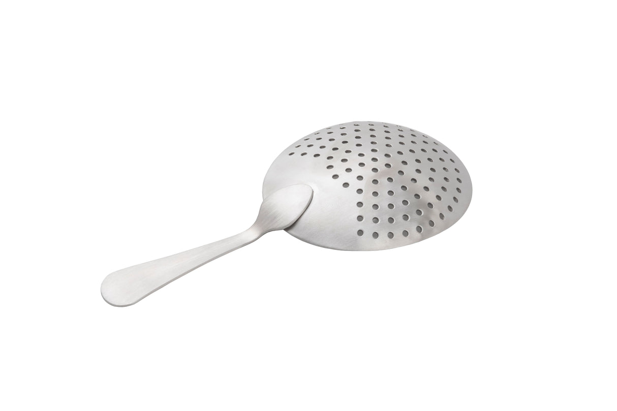 A silver Julep Strainer with a round, perforated bowl and flat handle, crafted from stainless steel, is placed on a white background. The symmetrical holes make it ideal for straining or serving foods.