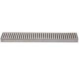 A rectangular TableCraft stainless steel floor drain cover with evenly spaced, parallel slots running lengthwise. The shiny, smooth surface resembles a drip tray and is photographed against a plain white background.