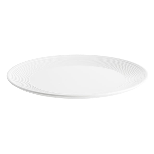 A plain, round white Pulito Collection Platter with a smooth center and a subtle ridged pattern around the rim, shown at a slight angle on a white background. This melamine platter appears clean and empty.