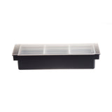 The TableCraft 104 Bar Condiment Holder is a rectangular black container with a transparent, slightly frosted plastic lid and multiple inner compartments. Dishwasher safe, it’s shown against a plain white background, with the lid fitting snugly on top.