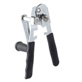 A chrome-plated can opener with black, textured handles and a rotating cutting wheel is shown upright against a white background. The partially open crank style can opener reveals its geared mechanism and handle grips for easy turning and leverage.