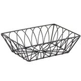 A rectangular, black metal wire serving basket from the Petal Collection features an open, geometric arch pattern on the sides and base. The airy TableCraft Products design is empty, set against a plain white background.