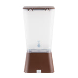 A tall, rectangular 5 gallon beverage dispenser with a brown lid and base. The transparent container features a spigot for easy dispensing and a white label on the base. Simple, functional, and dishwasher safe for convenient cleaning.
