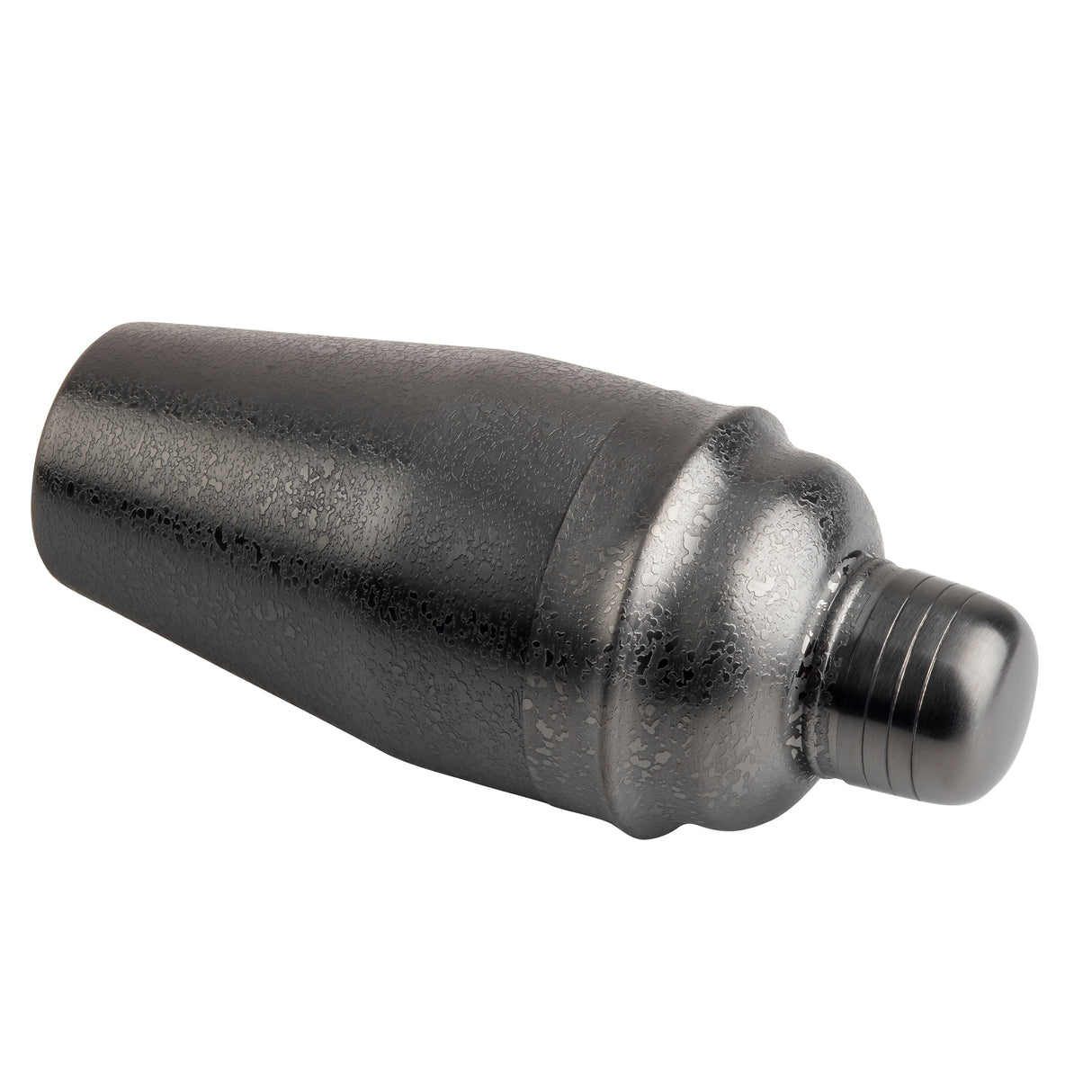 A matte black 18 oz cocktail shaker lies on its side against a white background. The stainless steel shaker has a textured, slightly rough surface and a sleek, modern design with a screw-on cap and a wider, tapered base.