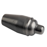 A matte black 18 oz cocktail shaker lies on its side against a white background. The stainless steel shaker has a textured, slightly rough surface and a sleek, modern design with a screw-on cap and a wider, tapered base.