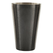 A tall, metallic, tapered vase with a dark brushed finish and a subtle, textured, pebbled surface. Crafted from stainless steel, it features a wide opening and sleek form inspired by the silhouette of a classic cocktail shaker.