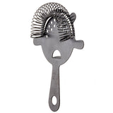 A stainless steel cocktail strainer with a flat handle and spring coil around its edge. The main plate has several holes and a cutout that, combined with its shape, resembles a surprised face with a round open mouth.