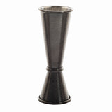 A stainless steel jigger with a hammered texture, this Japanese Jigger features two cone-shaped measuring cups—1 oz and 2 oz—joined at their bases. The metallic, slightly matte finish is perfect for precisely measuring cocktail ingredients.