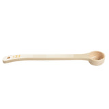 A beige, polycarbonate Spoonout measuring spoon with a long handle and round scoop featuring holes in the bottom. The handle has a textured grip and yellow measurement markings. NSF certified, it is placed on a plain white background.