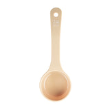 A beige Spoonout polycarbonate measuring cup with a long handle, labeled 3 oz and 90 ml in white text near the handle’s end. The cup is viewed from above, showing its round bowl and a hole at the tip for hanging.