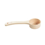 A beige polycarbonate Spoonout scoop with a long handle and round, perforated bowl. The handle features embossed measurement markings. The scoop rests on a white background.