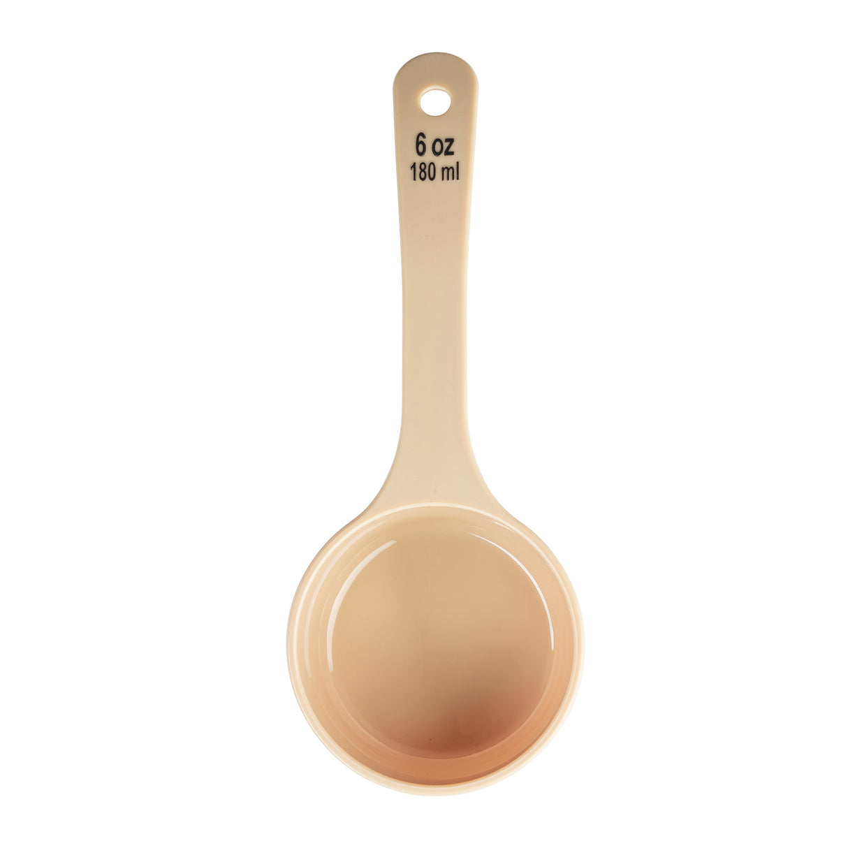 A beige Spoonout polycarbonate measuring cup holds 6 ounces or 180 milliliters. The black measurements are printed on the handle, which features a hole for hanging. The cup is photographed from above on a white background.