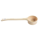 A beige polycarbonate measuring cup with a long handle, marked “1/2 cup” and “120 ml” in blue text at the end. The Spoonout cup is empty and positioned horizontally on a white background.
