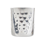 A shiny, stainless steel fry cup with a textured, hammered finish. The cup features irregularly spaced, round indentations and slight vertical ripples, creating a reflective pattern against the plain white background.